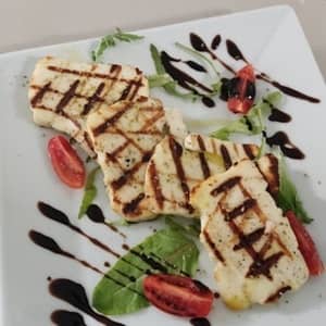 Grilled halloumi with sauce